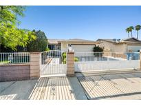 Charming single story home with gated entry and well-maintained landscaping at 5181 Morris St, Las Vegas, NV 89122