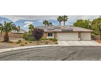 Charming single-story home with desert landscaping, three-car garage and solar panels at 3619 Bixbee Ct, Las Vegas, NV 89129