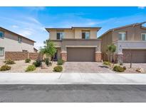Charming two-story home with a well-maintained front yard and brick driveway at 8870 Sasquatch Run Ave, Las Vegas, NV 89166