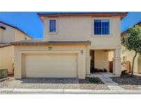 Inviting two-story home featuring a two-car garage and well-maintained landscaping at 1007 Shades End Ave, North Las Vegas, NV 89081