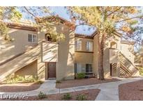 Charming condo building featuring a well-maintained exterior with desert landscaping and walkways at 9000 Las Vegas Blvd # 1016, Las Vegas, NV 89123