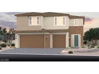Charming two-story home featuring a three car garage, brick accents, and manicured landscaping at 394 Arizona St # Lot 10, Boulder City, NV 89005