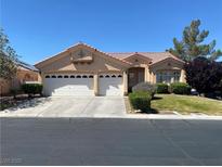 Charming single-story home featuring a three-car garage and well-maintained landscaping at 3882 Genoa Dr, Las Vegas, NV 89141