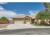 Charming single-story home featuring a stucco exterior, well-maintained landscaping, and a spacious three-car garage at 427 Rhythm St, Henderson, NV 89074