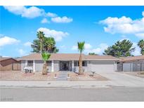 Charming single story home with palm trees and a well maintained front yard at 5162 Somerset Dr, Las Vegas, NV 89120