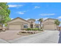 Charming single-story home with well-manicured landscaping, three car garage, and inviting curb appeal at 6150 Bunker Commons Ct, Las Vegas, NV 89108