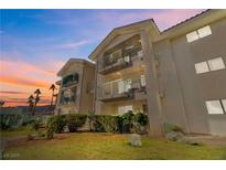 Cozy condos boast balconies and manicured lawns with desert mountain views at sunset at 3550 Bay Sands Dr # 1003, Laughlin, NV 89029