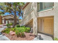 Inviting condo exterior with a well-maintained landscape at 5710 E Tropicana Ave # 1017, Las Vegas, NV 89122