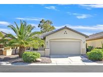 Charming single-story home with a well-manicured front yard and a two-car garage at 6001 Falconer Ave, Las Vegas, NV 89122