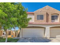 Charming two-story home featuring a two-car garage and well-maintained landscaping in a sunny location at 1672 Cloister Ave, Henderson, NV 89014