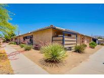 Charming single-story home with desert landscaping and a private courtyard at 255 N Lamb Blvd # D, Las Vegas, NV 89110