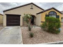 Charming single-story home featuring desert landscaping and a two-car garage at 3400 Denali Preserve St, Las Vegas, NV 89122