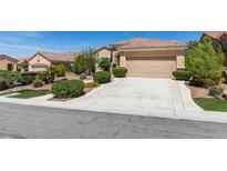 Charming single-story home featuring a well-maintained front yard and a two-car garage at , Henderson, NV 89044