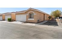 Charming single-story home featuring a two-car garage and desert landscaping at 2781 Dunstan Way, Las Vegas, NV 89123
