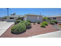Charming single-story home with well-maintained front yard and landscaping at 6205 Parsifal Pl, Las Vegas, NV 89107