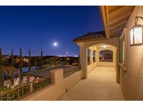 Wide balcony showing the night-lit skyline with an arched walkway to the right at 724 Step Beach St, Las Vegas, NV 89138