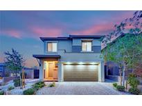 Charming two-story home with a spacious driveway and a two-car garage at 12341 Ferry Glide Ave, Las Vegas, NV 89138