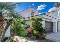 Elegant two-story home with desert landscaping and a private gated entrance, plus a two car garage at 217 Windsong Dr, Henderson, NV 89074