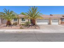 Charming single-story home featuring desert landscaping and a three-car garage at 2268 Alanhurst Dr, Henderson, NV 89052