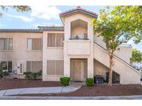 Charming two-story condo with traditional architecture and well-maintained landscaping at 3066 Tarpon Dr # 204, Las Vegas, NV 89120