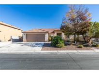Charming single-story home features a well-maintained front yard and a two-car garage at 3816 Sunking St, Las Vegas, NV 89130