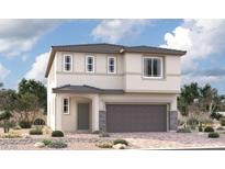 Charming two-story home featuring a two-car garage and a beautifully landscaped front yard at 9879 Angel Valley Dr, Las Vegas, NV 89178