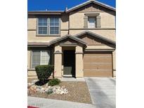 Charming two-story home featuring a well-maintained front yard and attached single-car garage at 1094 Paradise Resort Dr, Henderson, NV 89002