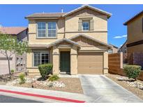 Inviting two-story home featuring a well-maintained front yard and attached one car garage at 1094 Paradise Resort Dr, Henderson, NV 89002