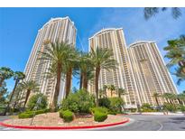 Beautiful high rise buildings with palm trees and lush landscaping in a sunny setting at 125 E Harmon Ave # 2907, Las Vegas, NV 89109