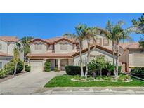Charming two-story home with well-maintained landscaping and a spacious three-car garage at 2388 Kenneth Ave, Henderson, NV 89052