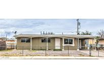 Charming single-story home with a fenced yard and an inviting front entrance at 2825 Berg St, North Las Vegas, NV 89030