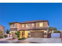 Charming two-story home with a tile roof and well-manicured landscaping at 9805 Turtle Walk Ave, Las Vegas, NV 89149