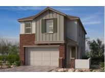 Two-story home with brick and siding, complemented by a two-car garage and well-manicured landscaping at 148 Silver Run Lane, Las Vegas, NV 89138