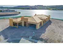 New construction home with lake view, featuring wood framing and modern design elements at 69 Bellissima Lago Ct, Henderson, NV 89011