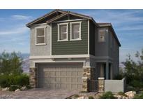 Charming home featuring a two-car garage and a blend of stone and siding accents at 155 Silver Run Ln, Las Vegas, NV 89138