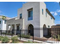 Stunning two-story home showcasing modern architectural design with clean lines and a neutral color palette at 2726 Marchetti Pl, Henderson, NV 89044