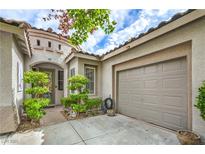 Inviting front exterior with a charming entrance and a well-maintained, attached one-car garage at 4419 Via Bianca Ave, Las Vegas, NV 89141