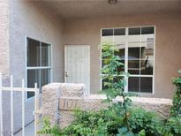 Inviting entrance to home with security door and decorative garden at 6908 Dorita Ave # 101, Las Vegas, NV 89108