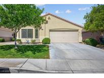 Charming single-story home featuring a two-car garage and well-maintained front yard at 7755 Pacific Rim Ct, Las Vegas, NV 89139