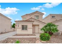 Charming two-story home with stucco exterior, tile roof, and well-maintained landscaping at 8873 Happy Stream Ave, Las Vegas, NV 89143