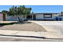 Charming single-story home featuring desert landscaping and a well-maintained front yard at 2135 Sombrero Dr, Las Vegas, NV 89169
