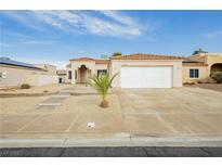 Charming single-story home featuring a two-car garage and low maintenance desert landscaping at 434 Viewmont Dr, Henderson, NV 89015