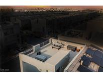 Relax on this spacious roof deck with seating and panoramic city views, perfect for entertaining at 8113 Misty Canyon Ave, Las Vegas, NV 89113