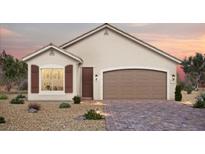 Charming single-story home with a two-car garage and neatly landscaped front yard at 87 Serene Tempo Ave, Henderson, NV 89011