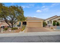 Inviting single-story home featuring desert landscaping and a two-car garage at 2820 Goldcreek St, Henderson, NV 89052