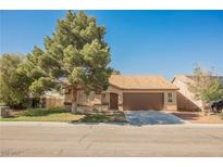 Charming single-story home with a well-maintained front yard and a two-car garage at 4336 Fenton Ln, North Las Vegas, NV 89032