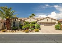 Charming single-story home with desert landscaping and a well-maintained two car garage at 5067 Pensier St, Las Vegas, NV 89135