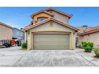 Charming two-story home featuring a spacious two-car garage and manicured landscaping at 4008 Lighthouse Ave, Las Vegas, NV 89110