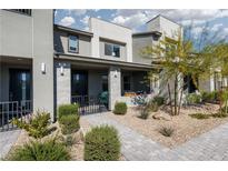 Beautiful two-story home featuring modern design and drought-tolerant landscaping at 494 Mahogany Ridge St, Las Vegas, NV 89138