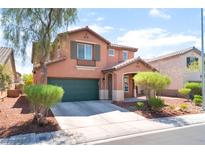 Inviting two-story home featuring a well-maintained yard, desert landscaping, and an attached two-car garage at 5852 Clear Haven Ln, North Las Vegas, NV 89081